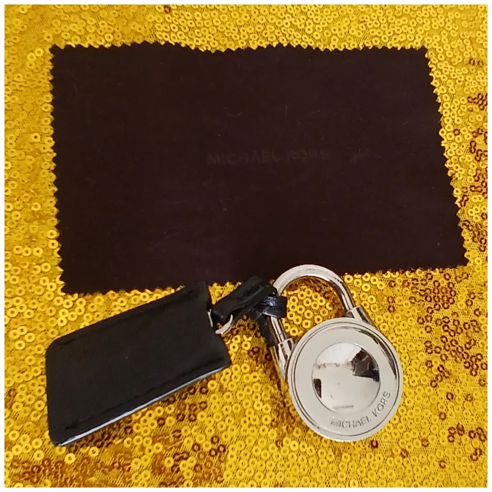 Michael Kors Black and Silver Key Holder And A Clothe Cleaner